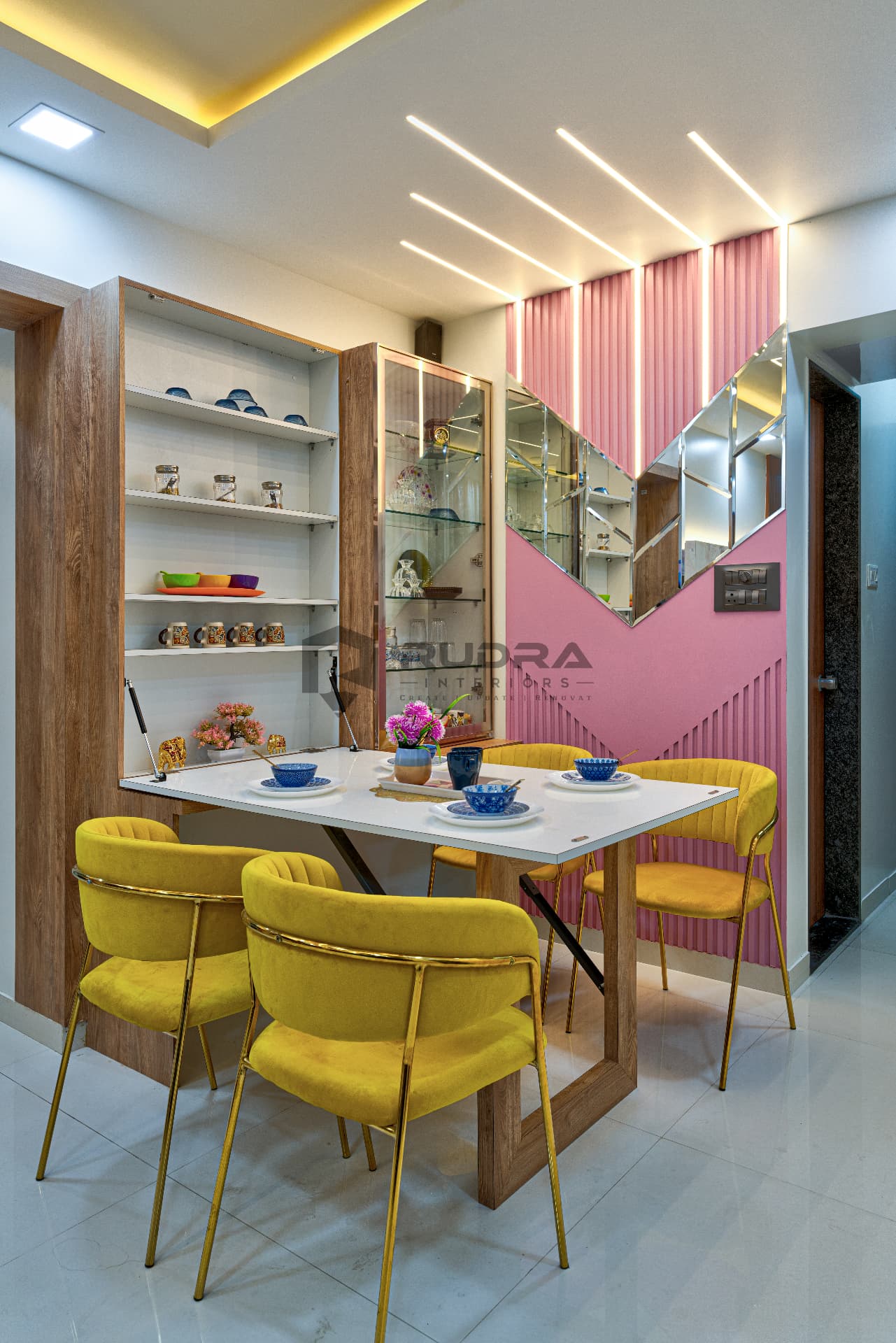 Foldable dining table with crockery unit and yellow chairs